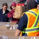 Food, housing prices have monthly food bank use soaring to 2 million